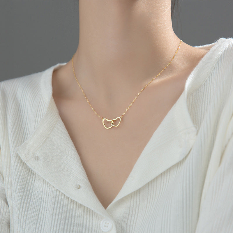 Collier en acier titane à double cœur entrelacé, bijoux