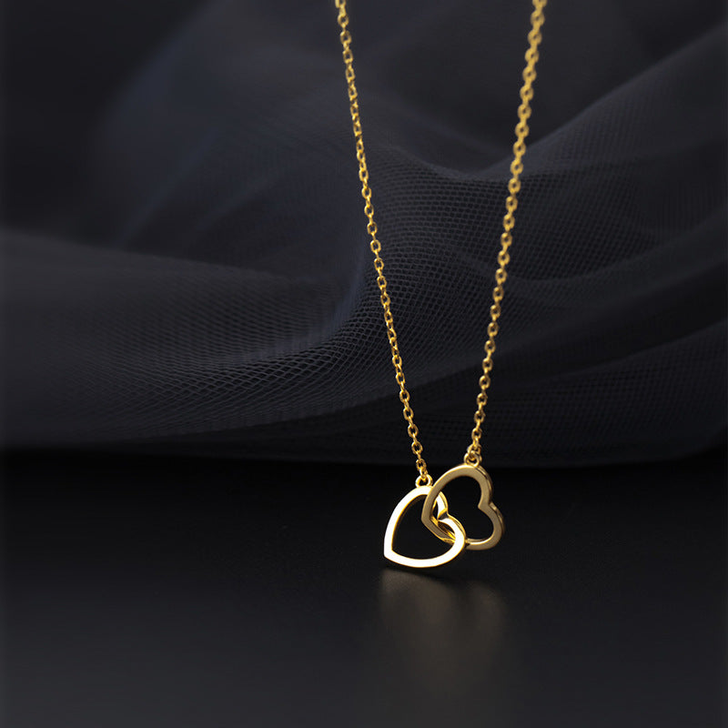 Collier en acier titane à double cœur entrelacé, bijoux