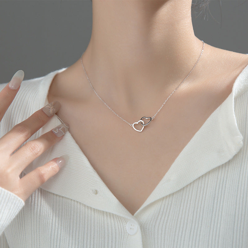 Collier en acier titane à double cœur entrelacé, bijoux