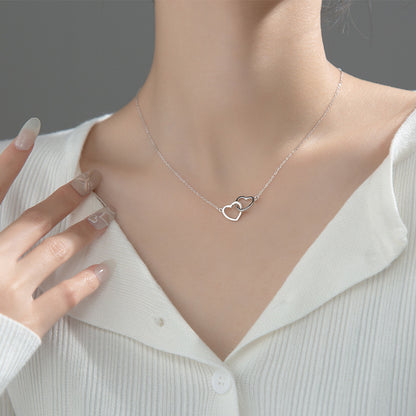 Collier en acier titane à double cœur entrelacé, bijoux