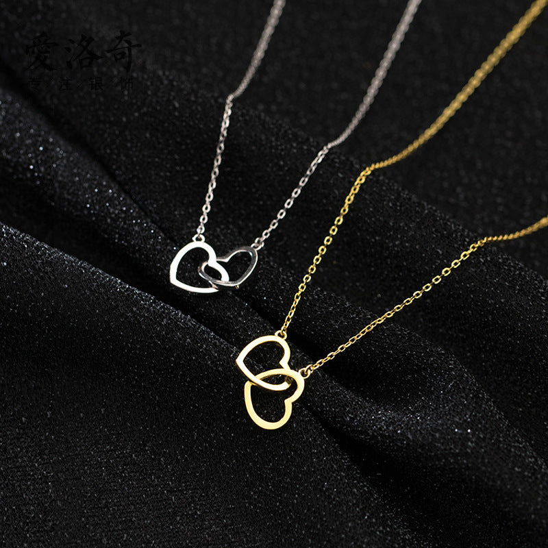 Collier en acier titane à double cœur entrelacé, bijoux